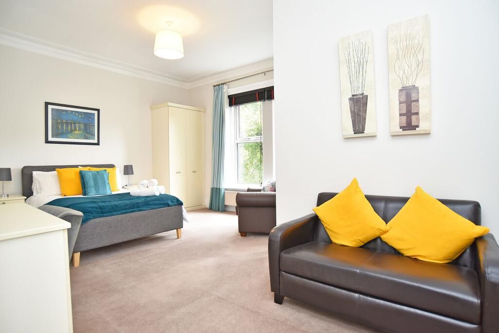 Principal bedroom with sitting area, family house Harrogate